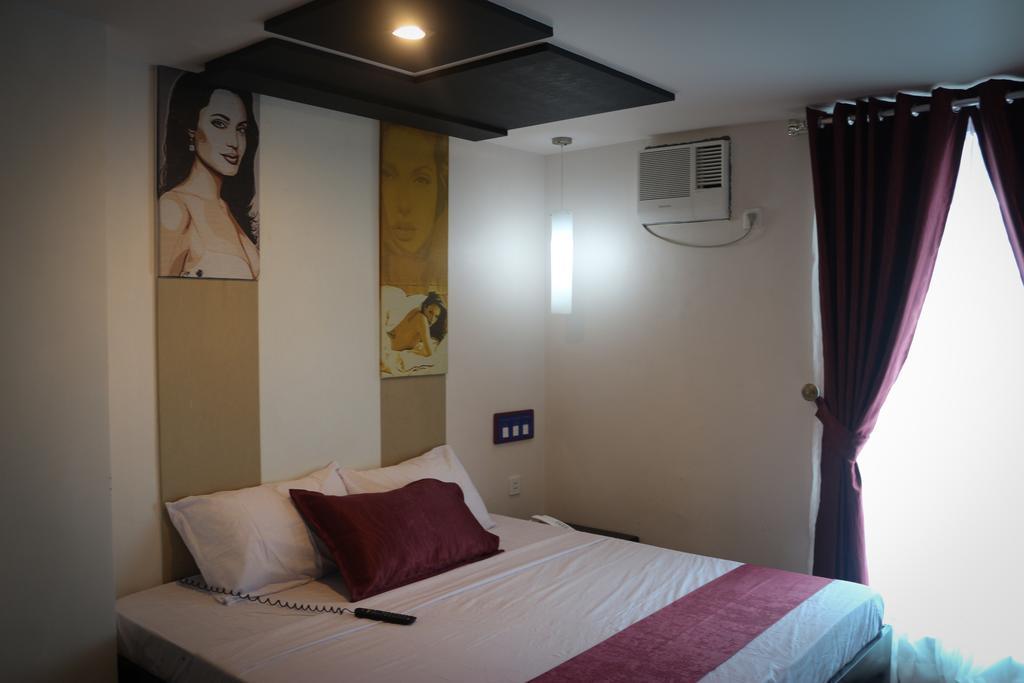 Icon Hotel North Edsa Кесон Сити Стая снимка