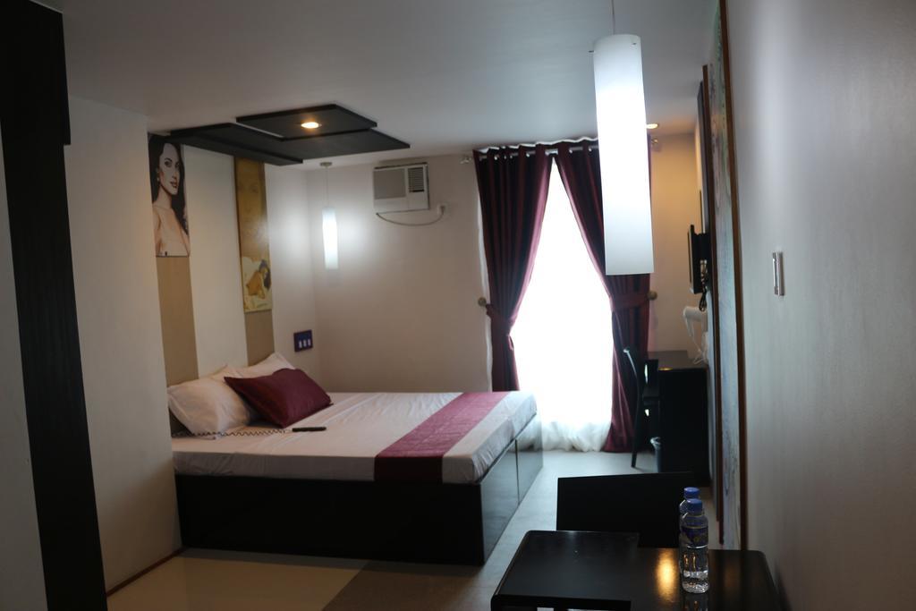 Icon Hotel North Edsa Кесон Сити Стая снимка
